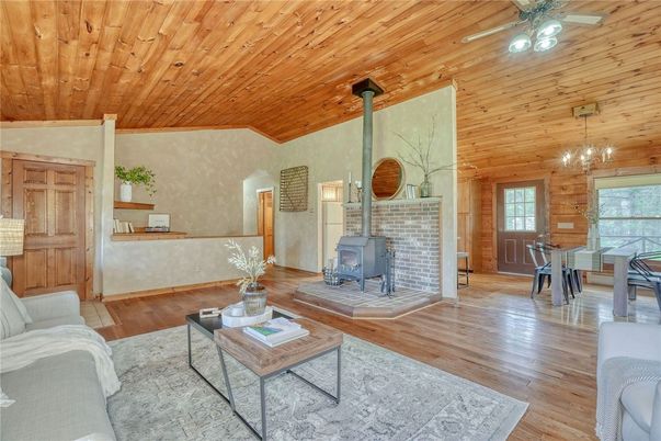 Dining room, Fireplace, Interior, Living room, Pendant Lights, Wooden Ceilings, Wood Texture Flooring, Wooden Walls