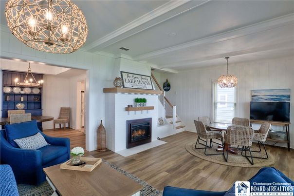 Chandelier, Dining room, Fireplace, Interior, Living room, Pendant Lights, Wood Texture Flooring