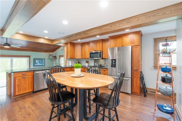 Dining room, Interior, Kitchen, Recessed Lighting, Stainless Steel Appliances, Wood Texture Flooring