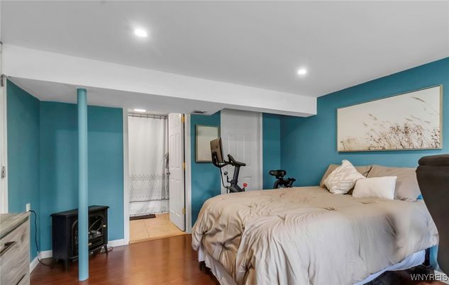 Bedroom, Fitness Equipment, Interior, Recessed Lighting, Wood Texture Flooring
