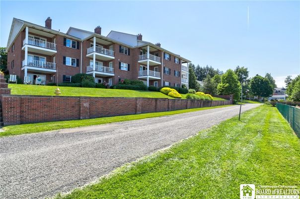 Backyard, Exterior, Facade, Brick Facade, Condo Building