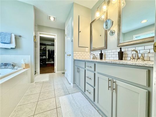 Bathroom, Dual Sink Vanities, Interior, Recessed Lighting, Wood Texture Flooring