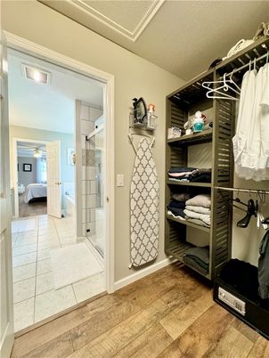 Bathroom, Glass Shower, Interior, Walk-in Closets, Wood Texture Flooring