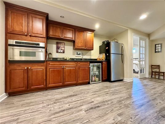 Interior, Kitchen, Recessed Lighting, Stainless Steel Appliances, Wood Texture Flooring