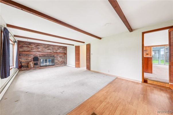 Empty room, Fireplace, Interior, Stone Walls, Wooden Beams, Wood Texture Flooring