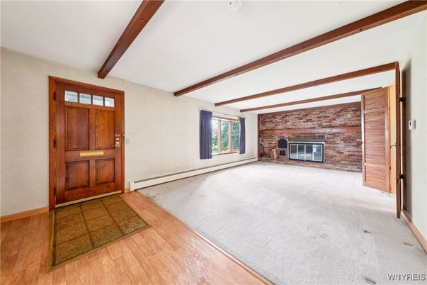 Empty room, Fireplace, Interior, Stone Walls, Wooden Beams, Wood Texture Flooring