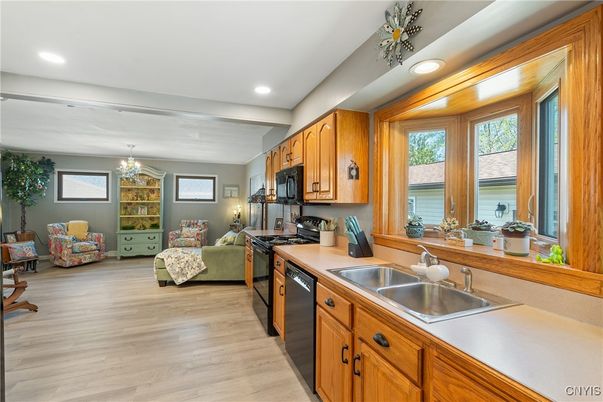 Chandelier, Interior, Kitchen, Living room, Recessed Lighting, Wood Texture Flooring