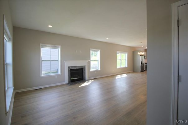 Chandelier, Empty room, Fireplace, Interior, Recessed Lighting, Wood Texture Flooring