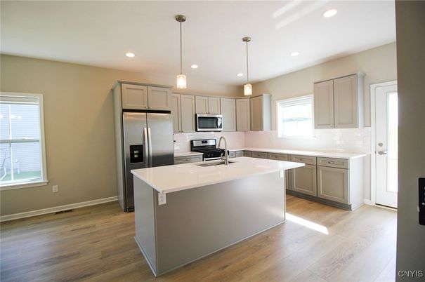 Interior, Kitchen, Pendant Lights, Recessed Lighting, Stainless Steel Appliances, Wood Texture Flooring