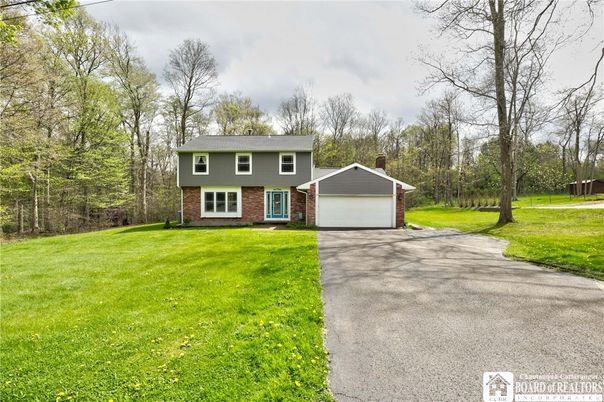 Attached, Backyard, Exterior, Facade, Brick Facade, Raised Ranch