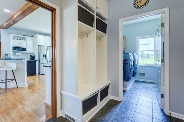 Interior, Kitchen, Recessed Lighting, Washer, Wood Texture Flooring