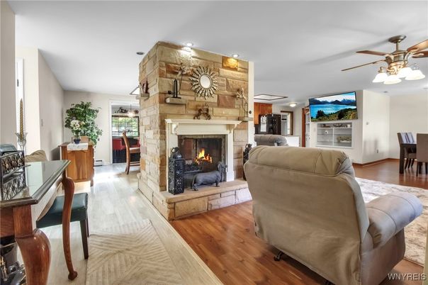 Dining room, Fireplace, Interior, Living room, Stone Walls, Wood Texture Flooring