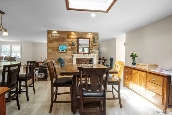 Dining room, Fireplace, Interior, Pendant Lights, Recessed Lighting, Stone Walls, Wood Texture Flooring