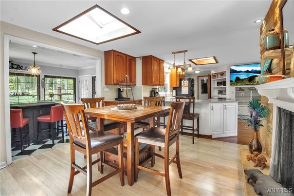 Dining room, Fireplace, Interior, Kitchen, Pendant Lights, Recessed Lighting, Wood Texture Flooring