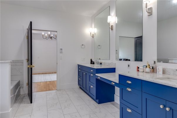 Bathroom, Chandelier, Dual Sink Vanities, Interior, Marble, Wood Texture Flooring