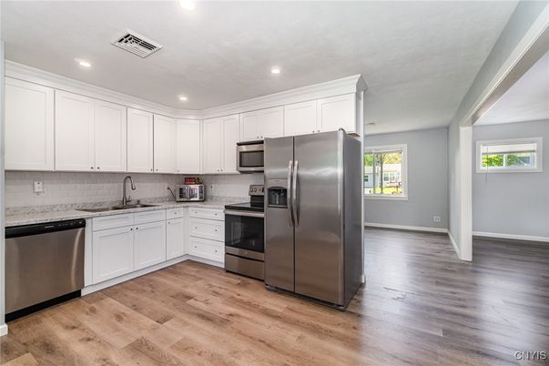 Interior, Kitchen, Recessed Lighting, Stainless Steel Appliances, Wood Texture Flooring