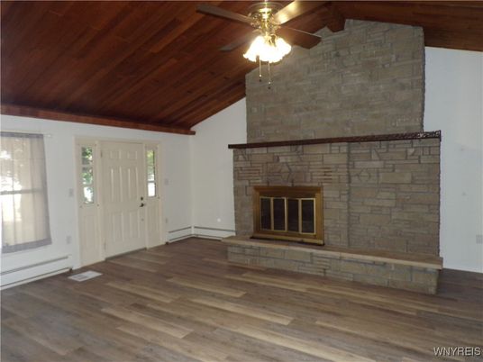 Empty room, Fireplace, Interior, Stone Walls, Wooden Beams, Wooden Ceilings, Wood Texture Flooring