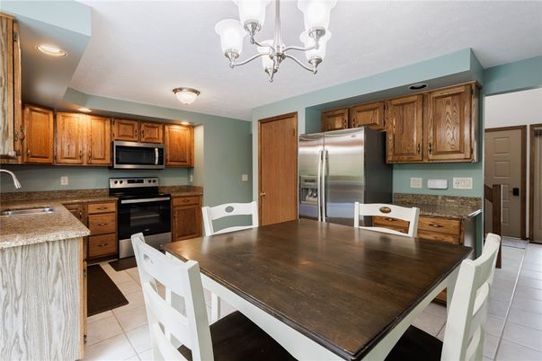 Chandelier, Dining room, Interior, Kitchen, Recessed Lighting, Stainless Steel Appliances
