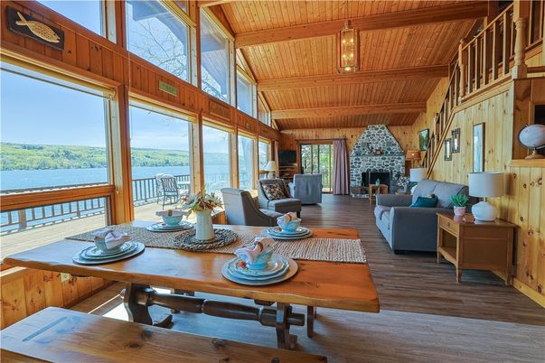 Dining room, Fireplace, Interior, Living room, Water, Wooden Beams, Wooden Ceilings, Wood Texture Flooring, Wooden Walls