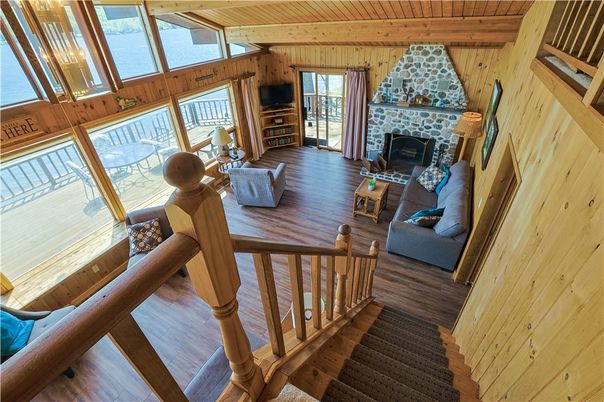 Dining room, Fireplace, Interior, Living room, Water, Wooden Beams, Wooden Ceilings, Wood Texture Flooring, Wooden Walls