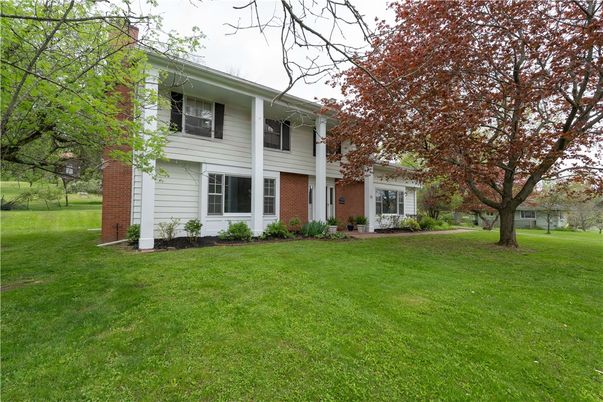 Backyard, Exterior, Facade, Brick Facade, Raised Ranch