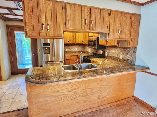 Interior, Kitchen, Tile Countertops, Wood Texture Flooring