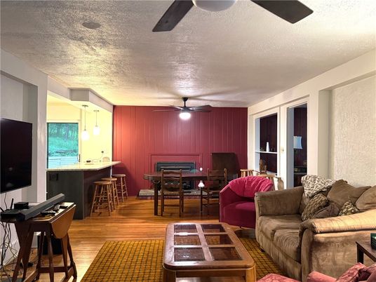 Dining room, Fireplace, Interior, Living room, Pendant Lights, Wood Texture Flooring
