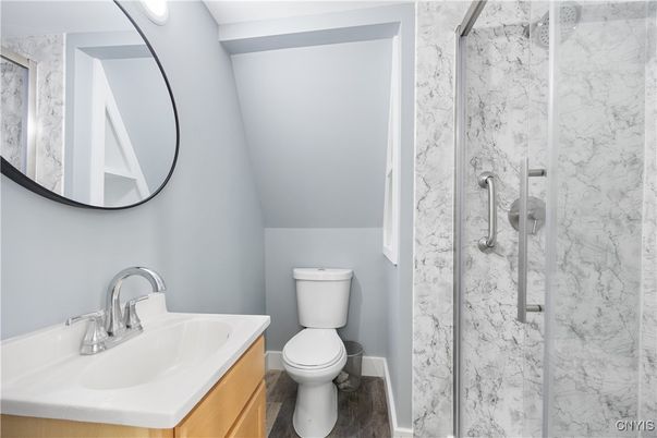 Bathroom, Glass Shower, Interior, Marble Walls, Wood Texture Flooring