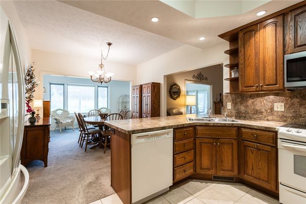 Chandelier, Dining room, Interior, Kitchen, Recessed Lighting, Stainless Steel Appliances