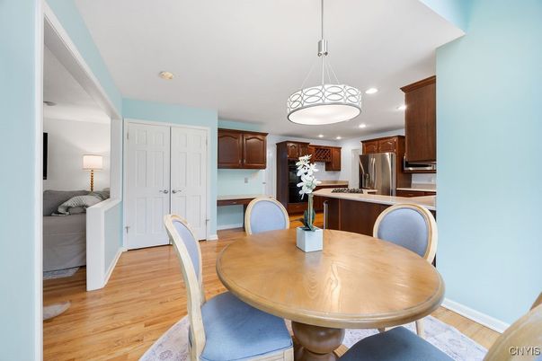 Dining room, Interior, Kitchen, Pendant Lights, Recessed Lighting, Stainless Steel Appliances, Wood Texture Flooring