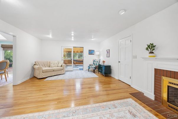 Fireplace, Interior, Living room, Recessed Lighting, Wood Texture Flooring