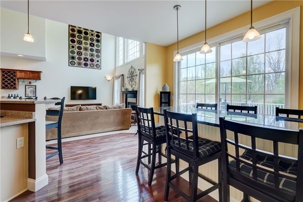 Dining room, Fireplace, Interior, Living room, Pendant Lights, Recessed Lighting, Wood Texture Flooring