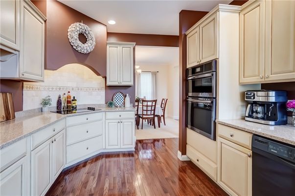 Dining room, Interior, Kitchen, Recessed Lighting, Stainless Steel Appliances, Wood Texture Flooring