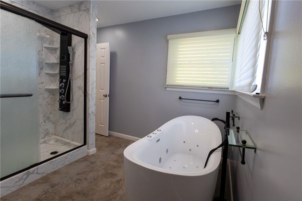 Bathroom, Free Standing Baths, Glass Shower, Interior, Marble, Marble Walls, Recessed Lighting