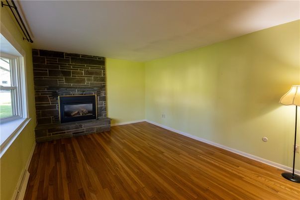 Empty room, Fireplace, Interior, Stone Walls, Wood Texture Flooring