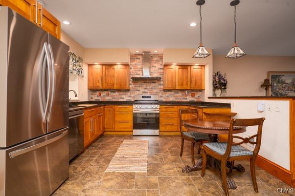Interior, Kitchen, Pendant Lights, Recessed Lighting, Stainless Steel Appliances, Stone Walls