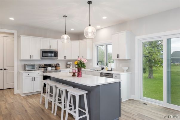 Interior, Kitchen, Pendant Lights, Recessed Lighting, Stainless Steel Appliances, Wood Texture Flooring
