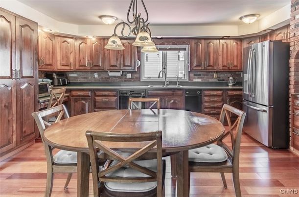 Dining room, Interior, Kitchen, Pendant Lights, Stainless Steel Appliances, Wood Texture Flooring