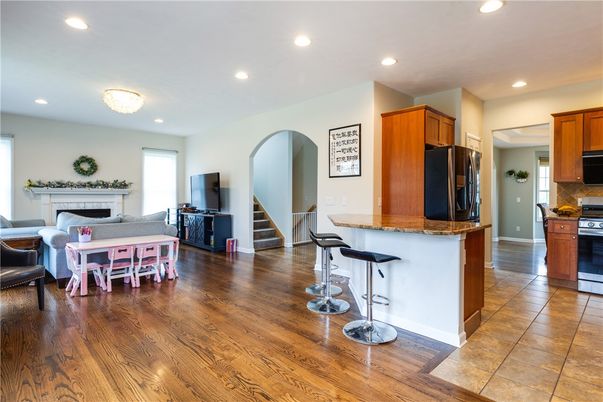 Chandelier, Dining room, Fireplace, Interior, Kitchen, Recessed Lighting, Wood Texture Flooring