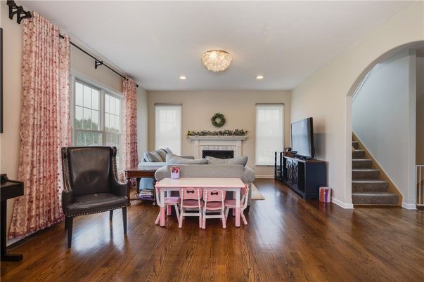Chandelier, Dining room, Fireplace, Interior, Living room, Recessed Lighting, Wood Texture Flooring