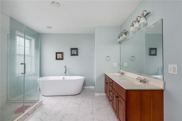 Bathroom, Dual Sink Vanities, Free Standing Baths, Glass Shower, Interior, Marble, Recessed Lighting