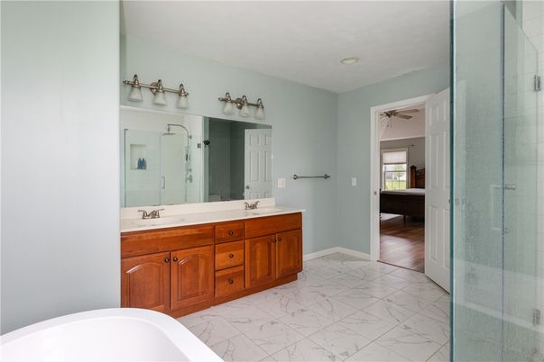 Bathroom, Dual Sink Vanities, Glass Shower, Interior, Marble, Recessed Lighting