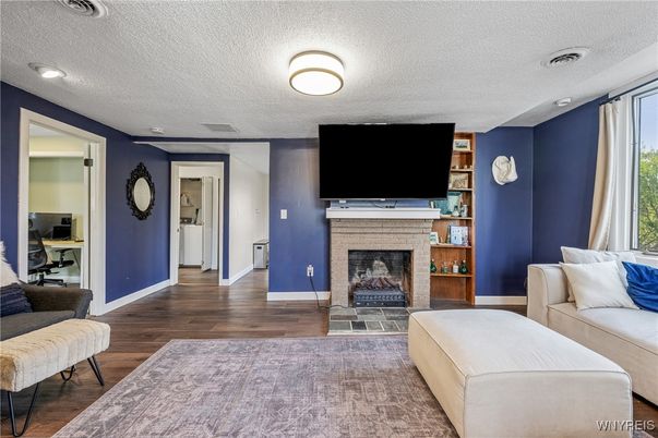 Fireplace, Interior, Living room, Recessed Lighting, Wood Texture Flooring