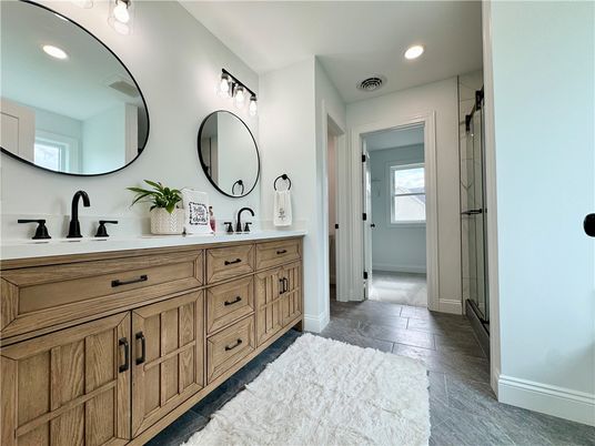 Bathroom, Dual Sink Vanities, Interior, Recessed Lighting, Wood Texture Flooring