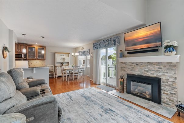 Chandelier, Dining room, Fireplace, Interior, Kitchen, Living room, Pendant Lights, Wood Texture Flooring