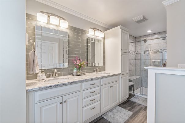 Bathroom, Dual Sink Vanities, Glass Shower, Interior, Recessed Lighting, Wood Texture Flooring