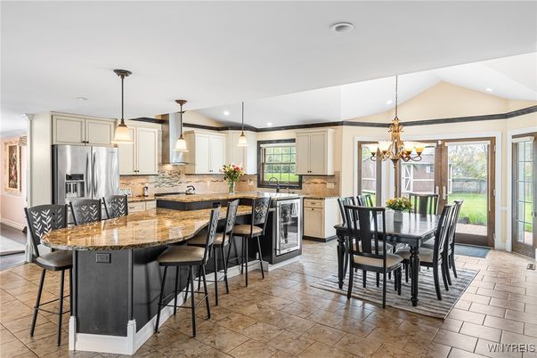 Chandelier, Dining room, Interior, Kitchen, Pendant Lights, Recessed Lighting, Stainless Steel Appliances
