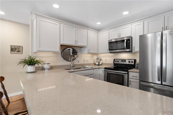 Interior, Kitchen, Recessed Lighting, Stainless Steel Appliances, Wood Texture Flooring