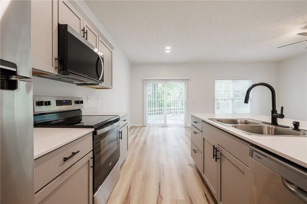 Interior, Kitchen, Recessed Lighting, Stainless Steel Appliances, Wood Texture Flooring