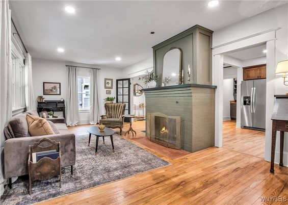 Fireplace, Interior, Kitchen, Living room, Recessed Lighting, Stainless Steel Appliances, Wood Texture Flooring